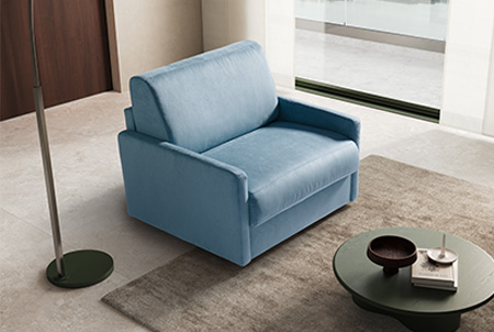Poltrona letto in tessuto azzurro