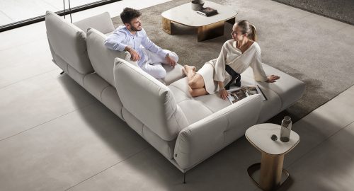 Piuma divano angolare con chaise longue in tessuto idrorepellente bianco
