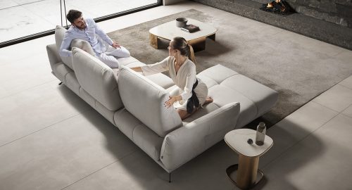 Piuma divano angolare con chaise longue in tessuto idrorepellente bianco